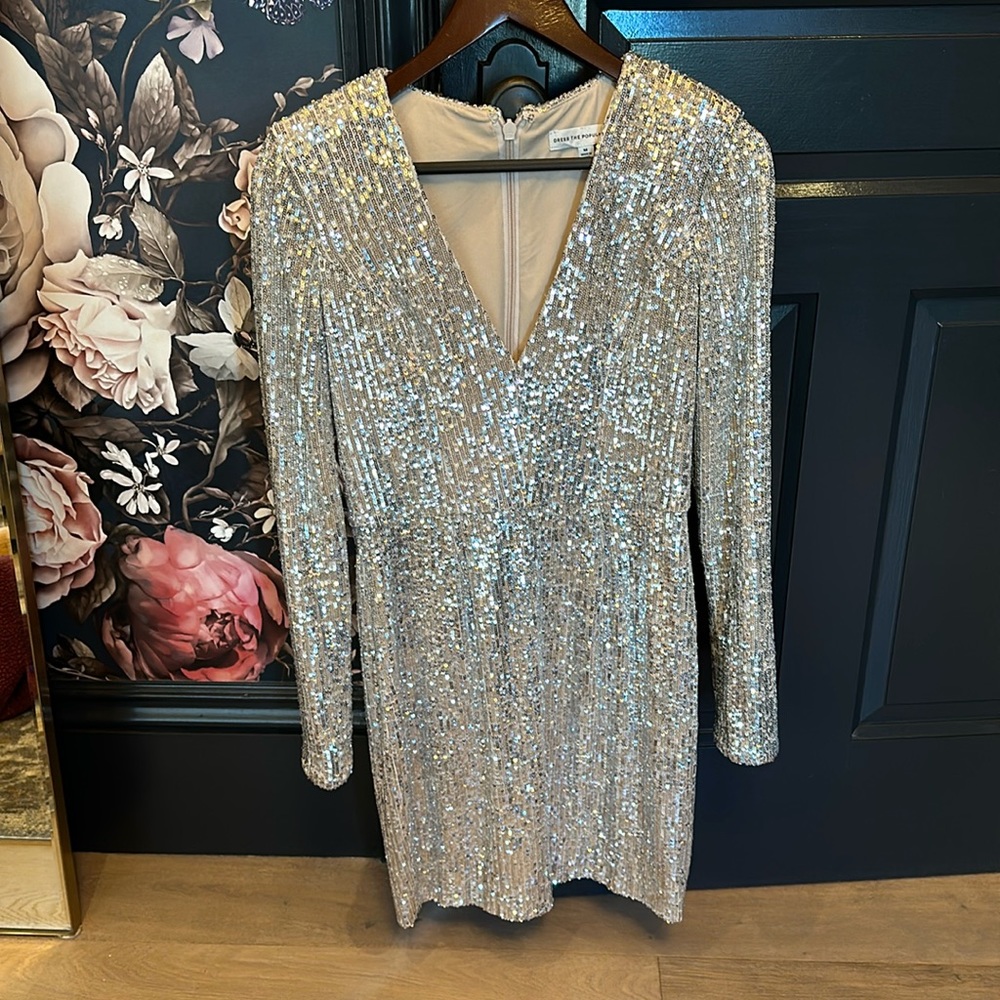 Dress the Population size M sparkly party dress!